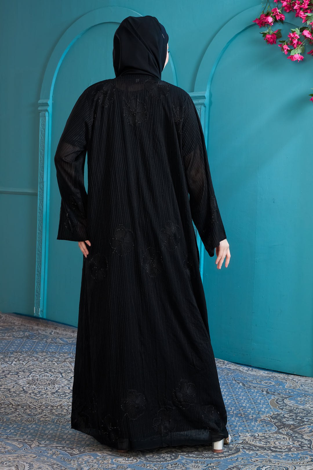 Sophisticated Black Abaya with Vertical Stripes and Floral Embellishments